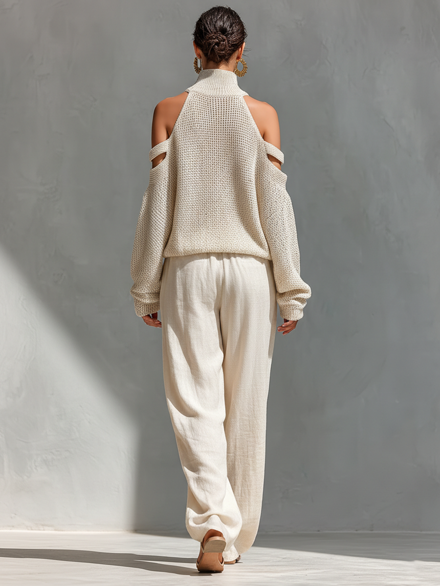 Conjunto de top de cuello tortuga en punto beige con hombros al descubierto y pantalones de pierna ancha